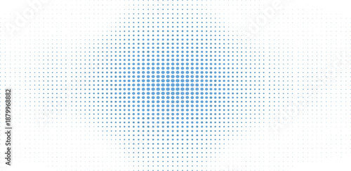 A blue gradient pattern of small dots forming a circular shape on a plain surface viewed from directly above