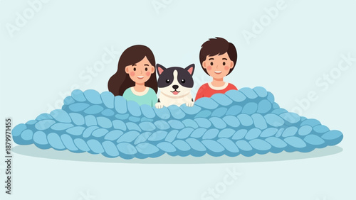 Cheerful children and dog peeking over cozy blue knitted blanket