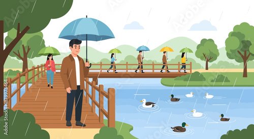 Man standing on bridge with umbrella.