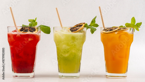 Drink for hot summer days. Fresh lime and lemon lemonade, dark green with bokeh background
