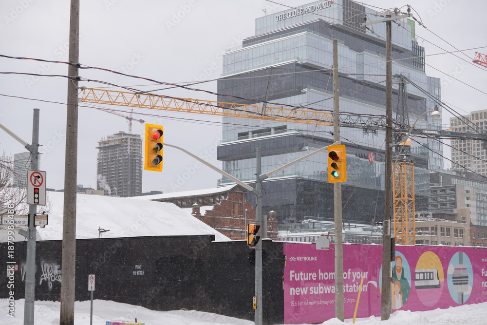 Fototapeta premium site of future Metrolinx Ontario Line Corktown Station near King St E, Berkeley St, Parliament St with view of The Globe and Mail Centre at 351 King St E, Toronto