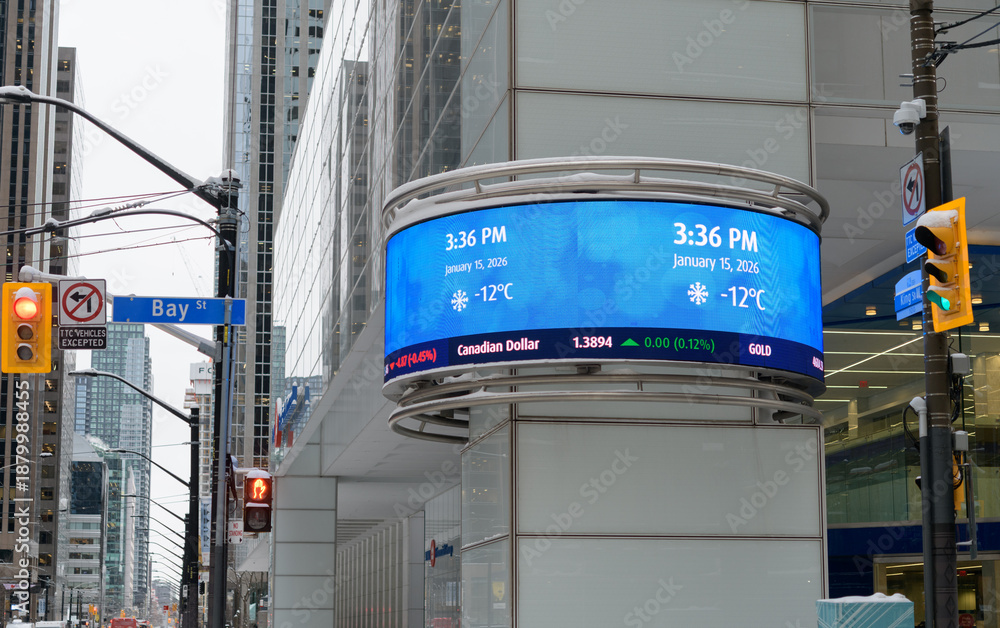 Naklejka premium digital marquee sign outside First Canadian Place / BMO Group northwest corner of King St W and Bay St, Toronto