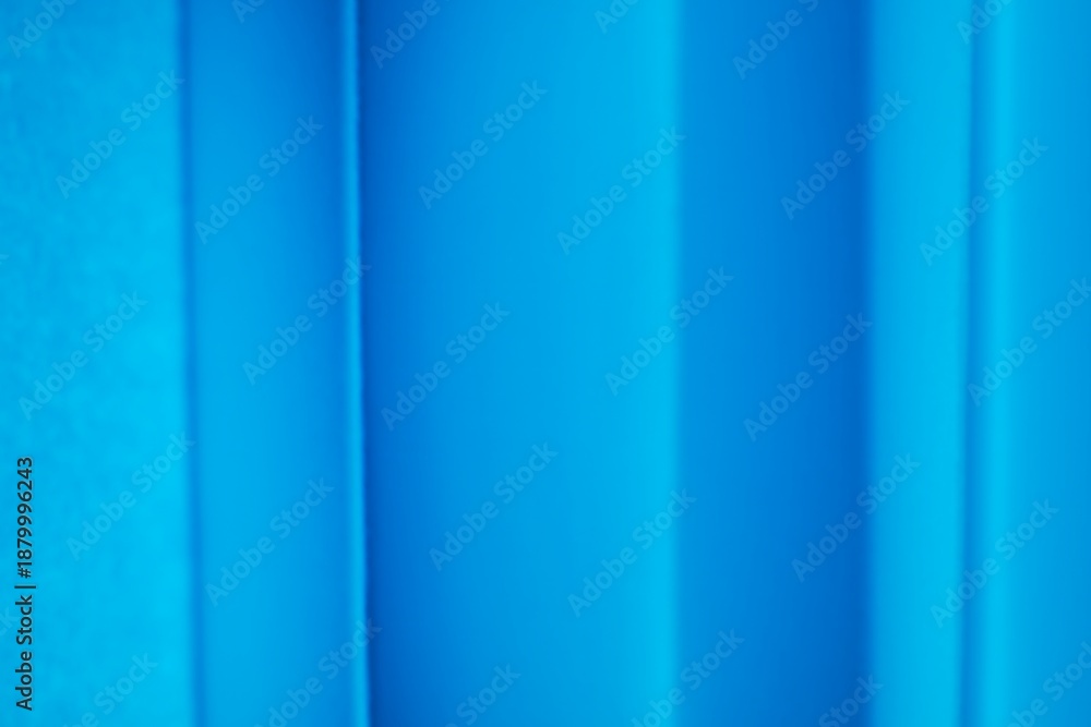 Obraz premium Abstract background of blue paper with folds and soft shadows.
