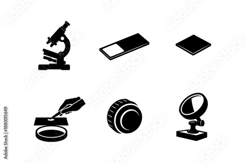 Science equipment silhouette set featuring microscope and lab tools