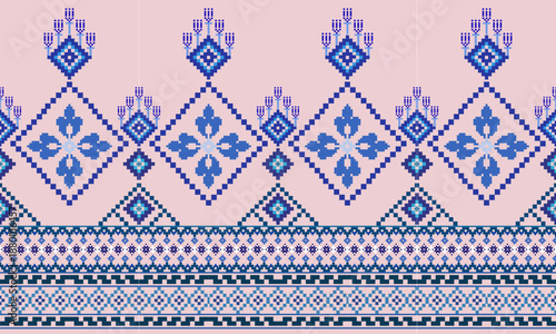 A seamless geometric ethnic pattern featuring blue diamond motifs and pixel-style pixel details with a pixel aesthetic on a soft pink background. Inspired by traditional folk embroidery