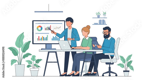 Business team analyzing data on screen in modern office setting