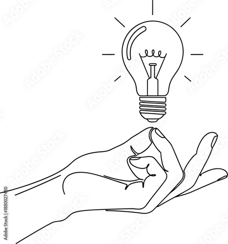Innovative hand holding glowing light bulb idea