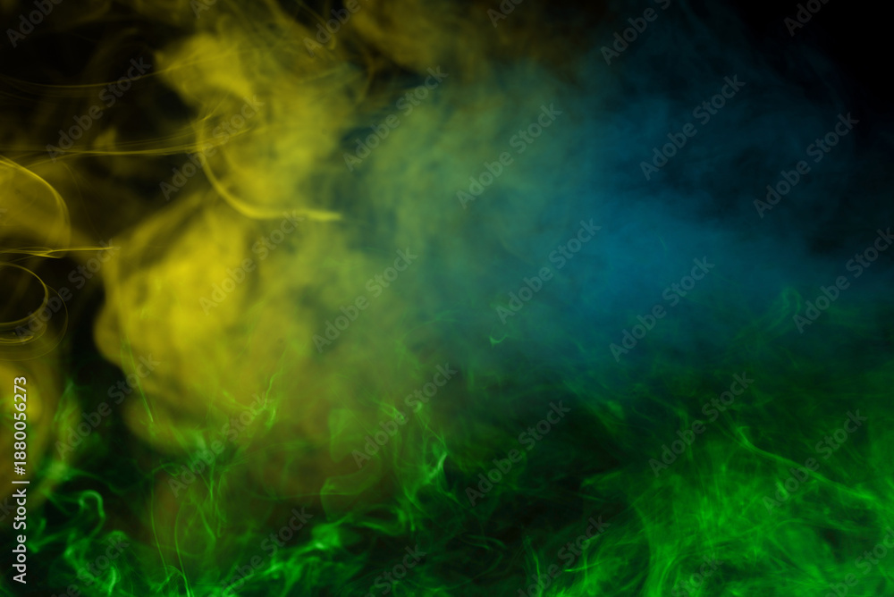 Obraz premium Yellow steam on a black background.