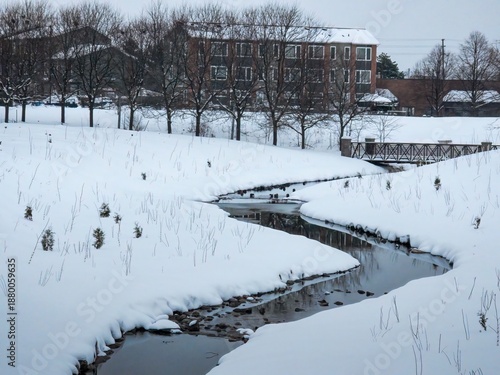 In the city at the creek, a fresh coating of winter snow in Eastbourne Park, Brapmton, Ont, Canada