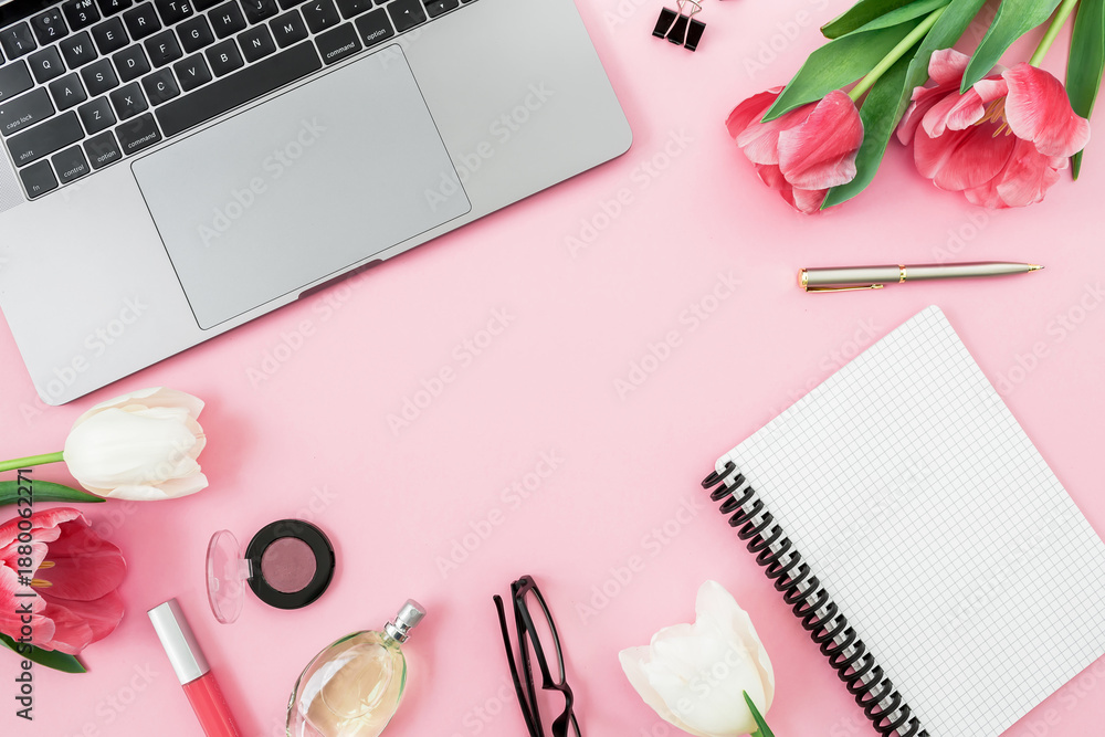 custom made wallpaper toronto digitalHome desk with laptop, flowers and pink diary on pink background. Flat lay.