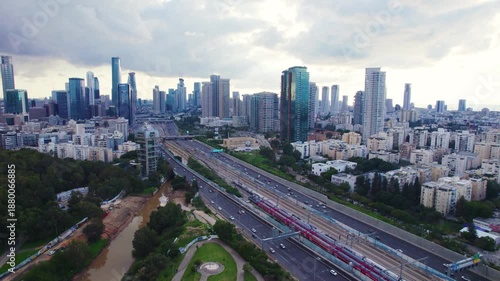 Aerial of Tel Aviv skyline near Ayalon road orbit left looking south Israel