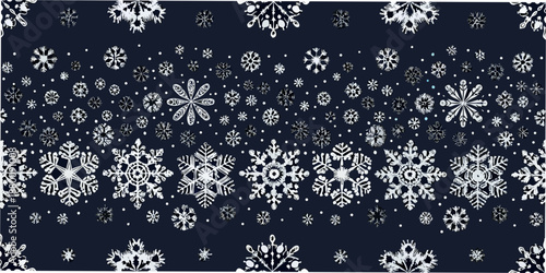 Intricate pattern of white snowflakes on a dark navy blue background