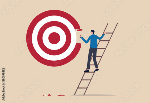 Purpose, set business goal or target, KPI, key performance indicator or set objective and achievement concept, ambitious businessman on ladder using paint roller to paint big dartboard, archery target