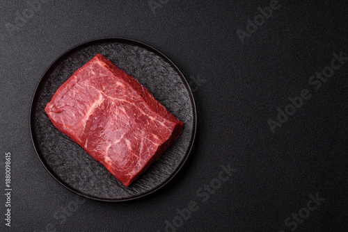Принти на полотні A piece of raw beef, a tenderloin for grilling or barbecue