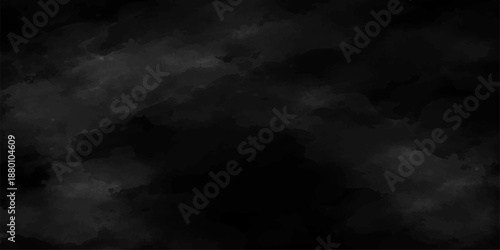 Dramatic dark smoke swirls against a black background like a moody storm cloud in an abstract night sky under an overcast nature weather scene