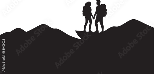 Silhouette of two people holding hands on a mountain peak