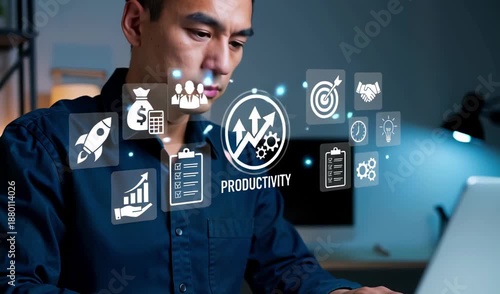 Wallpaper Mural Person types on a laptop, interacting with a digital interface displaying productivity and business growth icons. Torontodigital.ca