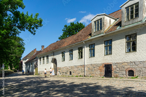 Historic Cobblestone Street in Old Fredrikstad Norway - White Brick Buildings in Gamlebyen