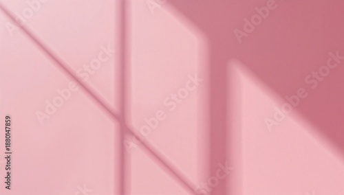 Soft Light Creates Shadows on a Pink Wall in a Simple Interior Space During the Late Afternoon
