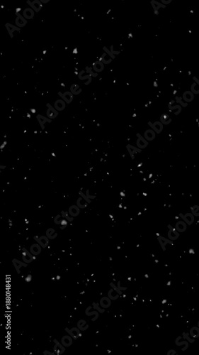 Vertical falling snow animation, winter snow on black background