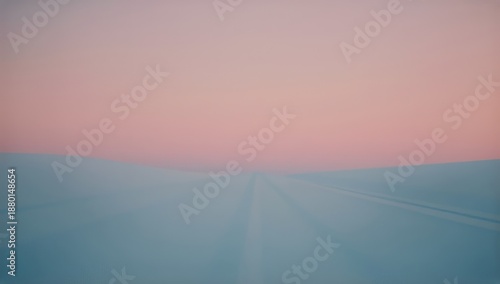 Sunset Sky Over Open Road With Soft Colors and Distant Horizon