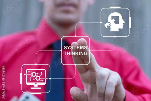 Business person using virtual touch screen presses the text SYSTEMS THINKING. Systems thinking concept. Traditional and systems thinking model.