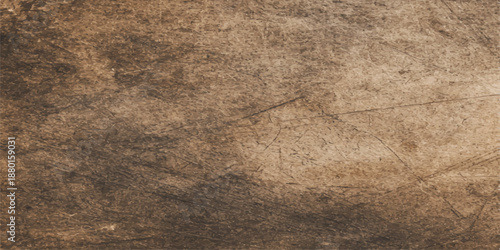 A vintage brown leather and aged cardboard texture background featuring a rough, weathered pattern of antique parchment and recycled material for a grunge surface design