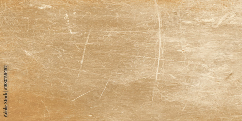 Vintage brown parchment background with an aged grunge texture and stained antique paper surface for a retro wallpaper design