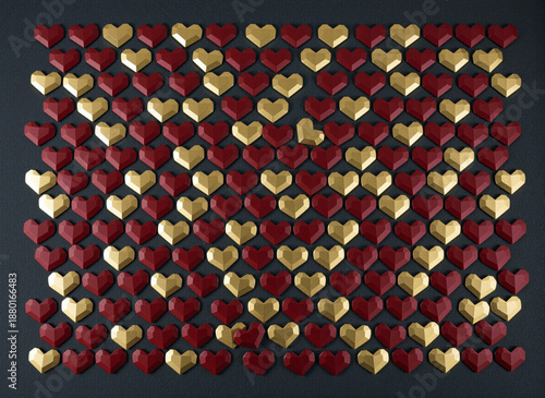 3D faceted red and gold hearts arranged in a geometric pattern on a dark background