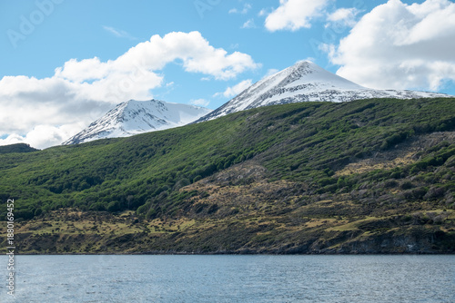 Wonderful scenery with snow covered mountains and hills with forests in Ushuaia, Argentina