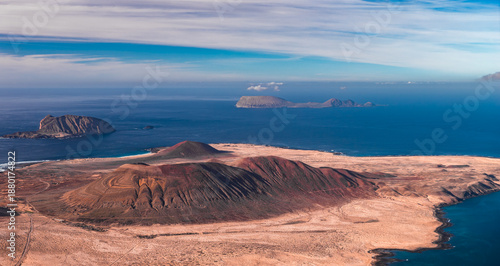 Quadro em tela Aerial view of northern Lanzarote shows cinder cones, caldera rims, and lava slopes