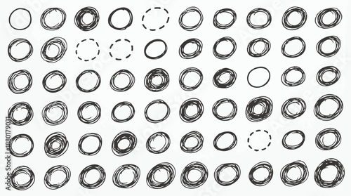 Collection of various metal washers and rings on white background