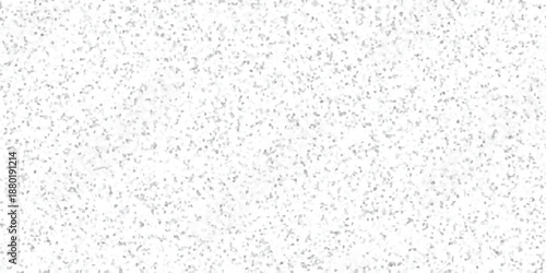 Abstract speckled texture with a dense scattering of tiny grey and white irregular geometric fragments forming a subtle granular background