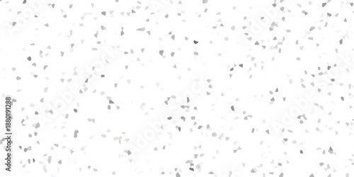Sparse distribution of small grey and white irregular mosaic fragments on a clean white background offering a delicate textured overlay for creative projects