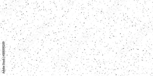 Subtle grayscale mosaic pattern with irregular small tesserae creating a textured speckled background for design and abstract concepts