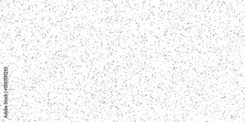 Subtle abstract texture with a dense field of small, irregular grey and white geometric shapes creating a light, speckled background pattern