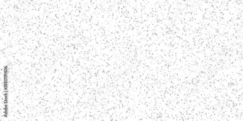 Subtle mosaic pattern of small irregular grey and white polygonal shapes creating a textured abstract background for design and decoration