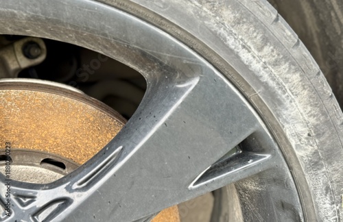 Ferric Brake Deterioration, Oxidized Brake Rotor And Caliper Indicating Urgent Repair Needs, Severely Rusted Brake Parts On Luxury Vehicle Requiring Immediate Attention For Safety