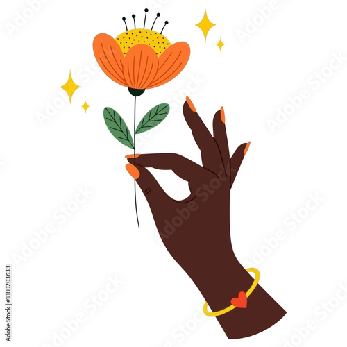 Elegant dark skinned hand gently holding an orange stylized flower stem with bright orange manicured nails and a golden heart bracelet accessory beauty delicate nature love minimalist