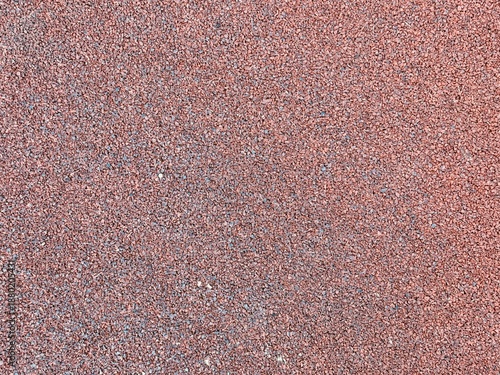 Red Gravel Surface, Compact Stones Create Sturdy Foundation, Earthy Tones With Fine Granules Ensure Durability, Slipresistant Gravel Provides Reliable Footing For Sports Facilities