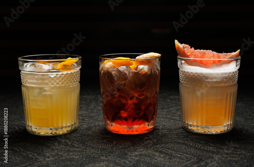 Refreshing cocktails served in glassware with citrus garnishes during an evening gathering