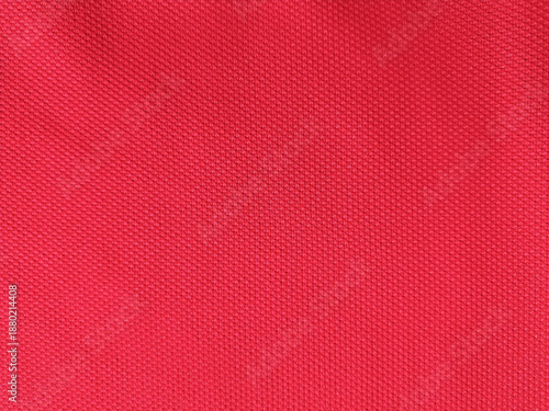 Fotografía Red synthetic fabric texture with micro woven pattern, close-up textile background for sports and fashion design