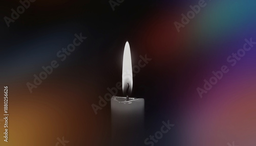 single candle flame against a dreamy colorful blur background