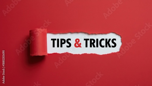 A torn red paper revealing tips and tricks to share a helpful learning message and spark a new idea.