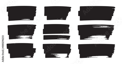 Set of irregular black rectangular shapes with varied brush paint application