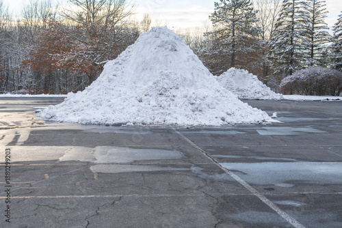Bild auf Leinwand snow pile on the parking lots after snow storm