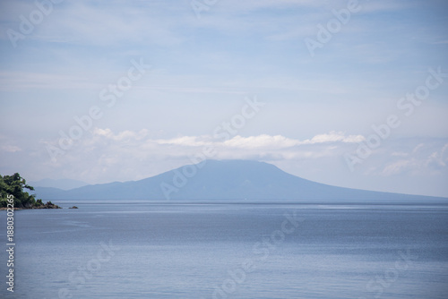 tropical scenery blue ocean blue sky Islands in the Background