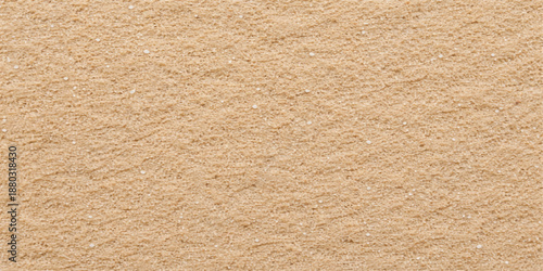 A closeup of a brown carpet texture background features a rough, vintage cardboard surface with a beige kraft paper pattern and a blank, textured grunge material backdrop