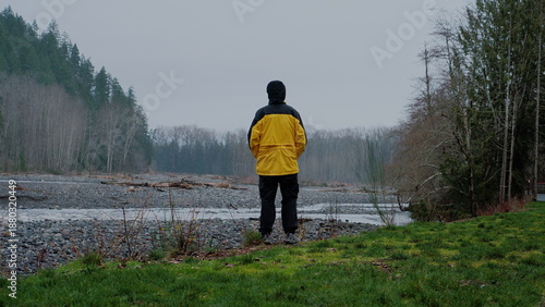 man walking in the woods