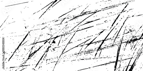 Abstract black and white grunge texture featuring distressed scratches and linear marks. Black and white distressed grunge scratch texture overlay background. 